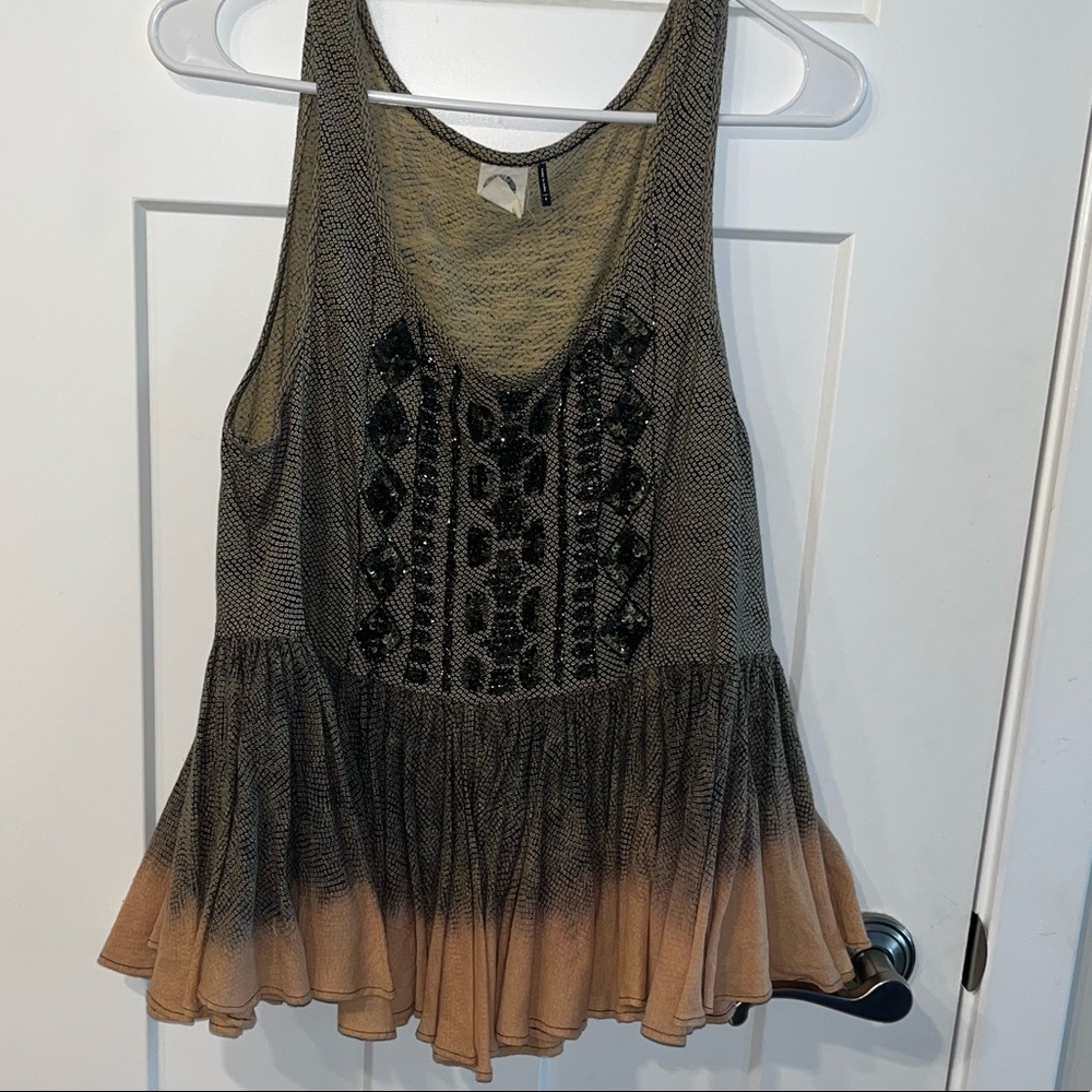 Bead embroidered peplum top